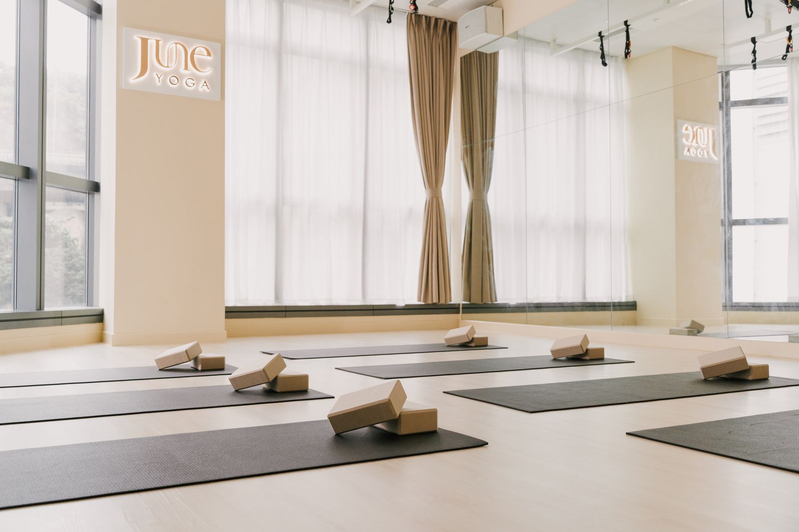 Studio mats and June Yoga neon